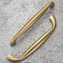 Load image into Gallery viewer, Side View of Brushed Gold Finish on Cabinet Pulls and Knobs