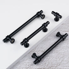 Load image into Gallery viewer, close-up of matte black finish on t bar drawer pulls - anti-rust coating