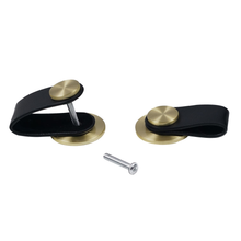 Загрузить изображение в средство просмотра галереи, Black leather cabinet knobs with brushed brass buttons, shown with an installation screw, ideal for wardrobes and kitchen drawers.