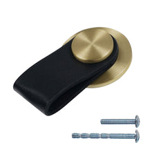 Загрузить изображение в средство просмотра галереи, Black leather cabinet knob with brushed brass and zinc alloy base, shown with screws for easy installation - Triumph Hardware