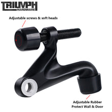 Load image into Gallery viewer, Matte black hinge pin door stopper with adjustable screws and rubber tips, Triumph Hardware logo, protects walls and doors.