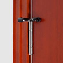 Load image into Gallery viewer, Matte black adjustable door stopper on hinge pin, protects doors and walls. Heavy-duty zinc alloy with soft rubber tip by Triumph Hardware.