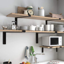 Load image into Gallery viewer, Kitchen with Midofar heavy-duty shelf brackets supporting rustic wooden shelves, displaying dishes and a microwave above a sink.