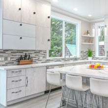 Load image into Gallery viewer, installing oil rubbed bronze drawer knobs on kitchen cabinet - DIY installation