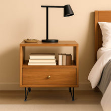 Load image into Gallery viewer, Wooden bedside table with books and lamp, fitted with matte black 3-rod hairpin furniture legs, enhancing modern bedroom decor.
