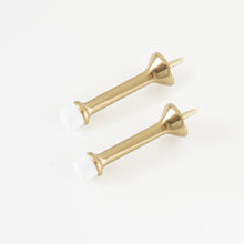 Load image into Gallery viewer, Two champagne bronze rigid door stops manufactured from premium anti-fading zinc alloy.
