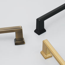 Carregar imagem no visualizador da galeria, Close-up of three 19 inch zinc alloy refrigerator handles in black, bronze, and gold colors for stylish kitchen upgrades.
