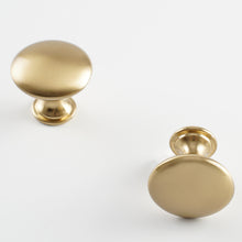 Load image into Gallery viewer, Zinc Alloy Round Cabinet Knobs in Brushed Brass finish, showcasing a smooth and sleek design for stylish cabinetry.
