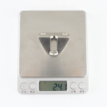 Load image into Gallery viewer, A digital scale weighing one component of the Internal Handle Adapter Set at 24.1 grams.
