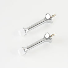 Load image into Gallery viewer, Two polished silver heavy duty door stoppers featuring anti-fading zinc alloy construction.
