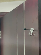 Load and play video in Gallery viewer, Video demonstration of the zinc alloy door stop hook installed in a commercial gym or clothing store changing room.
