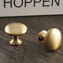 Load image into Gallery viewer, Zinc Alloy Round Cabinet Knobs in brushed brass finish, showcasing a premium design for stylish home decor.
